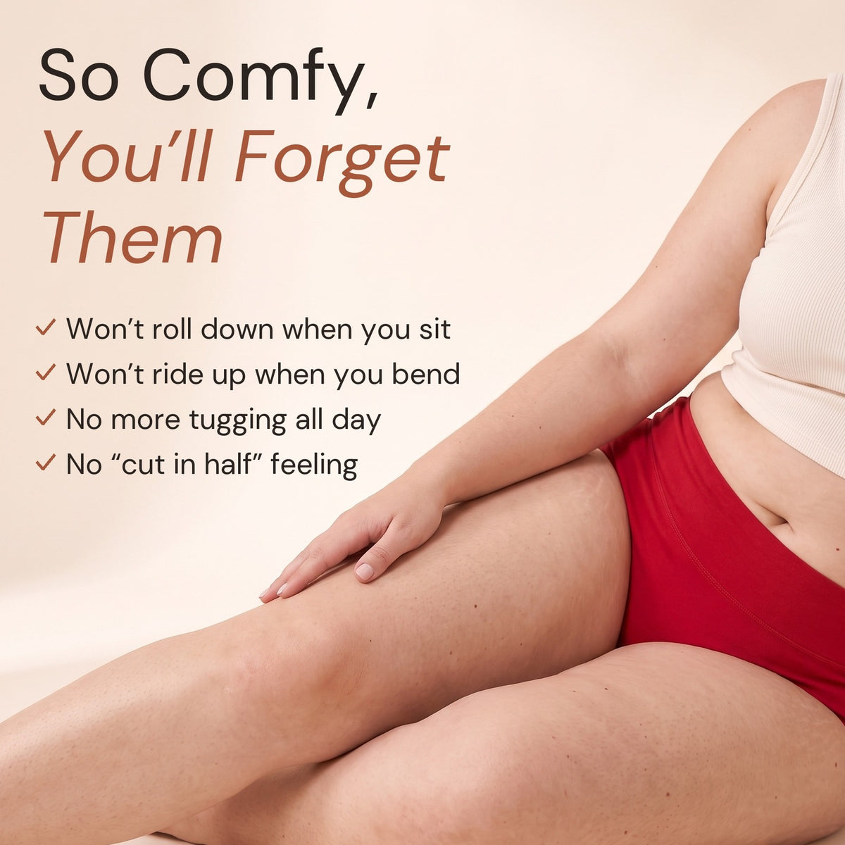 So comfy, you'll forget them: woman sitting on the floor in a red Jadea high-waisted brief. Won't roll down when you sit, won't ride up when you bend, no more tugging all day, no cut in half feeling