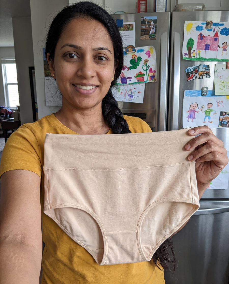 Woman wearing Jadea high-waist cotton brief