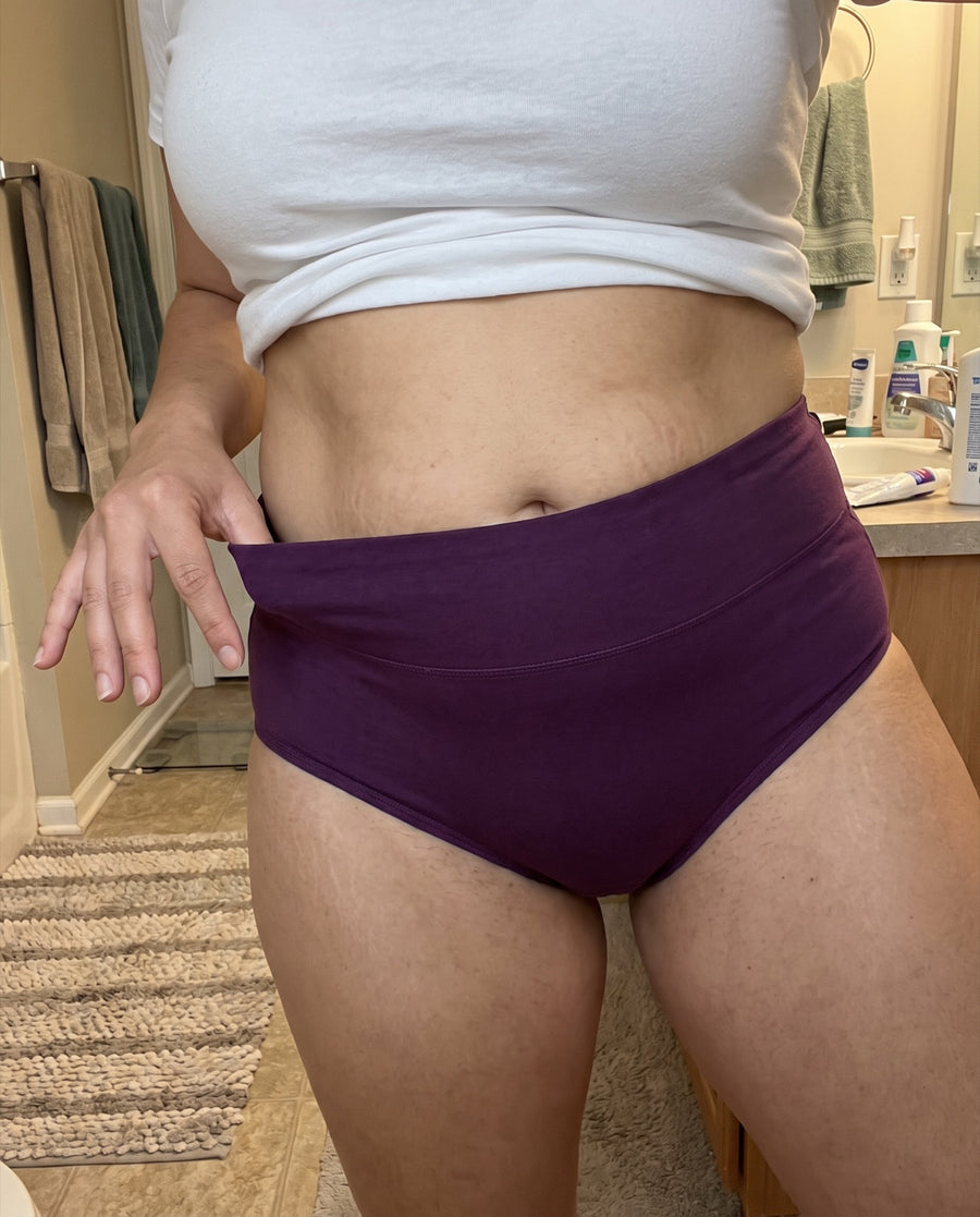 Woman wearing Jadea high-waist cotton brief