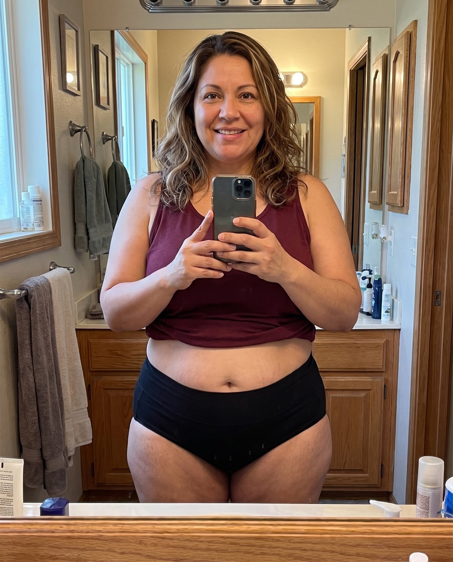 Woman wearing Jadea high-waist cotton brief
