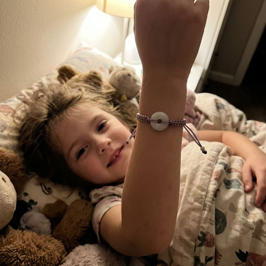 Child wearing the Jadea bracelet