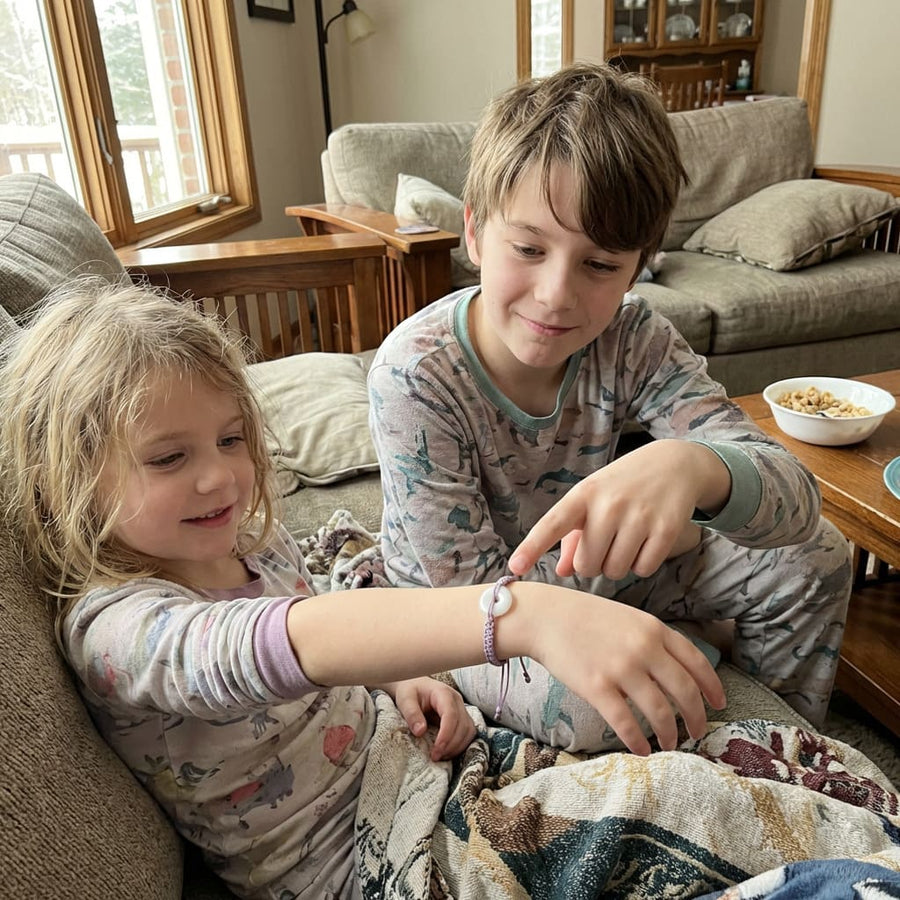 Child wearing the Jadea bracelet
